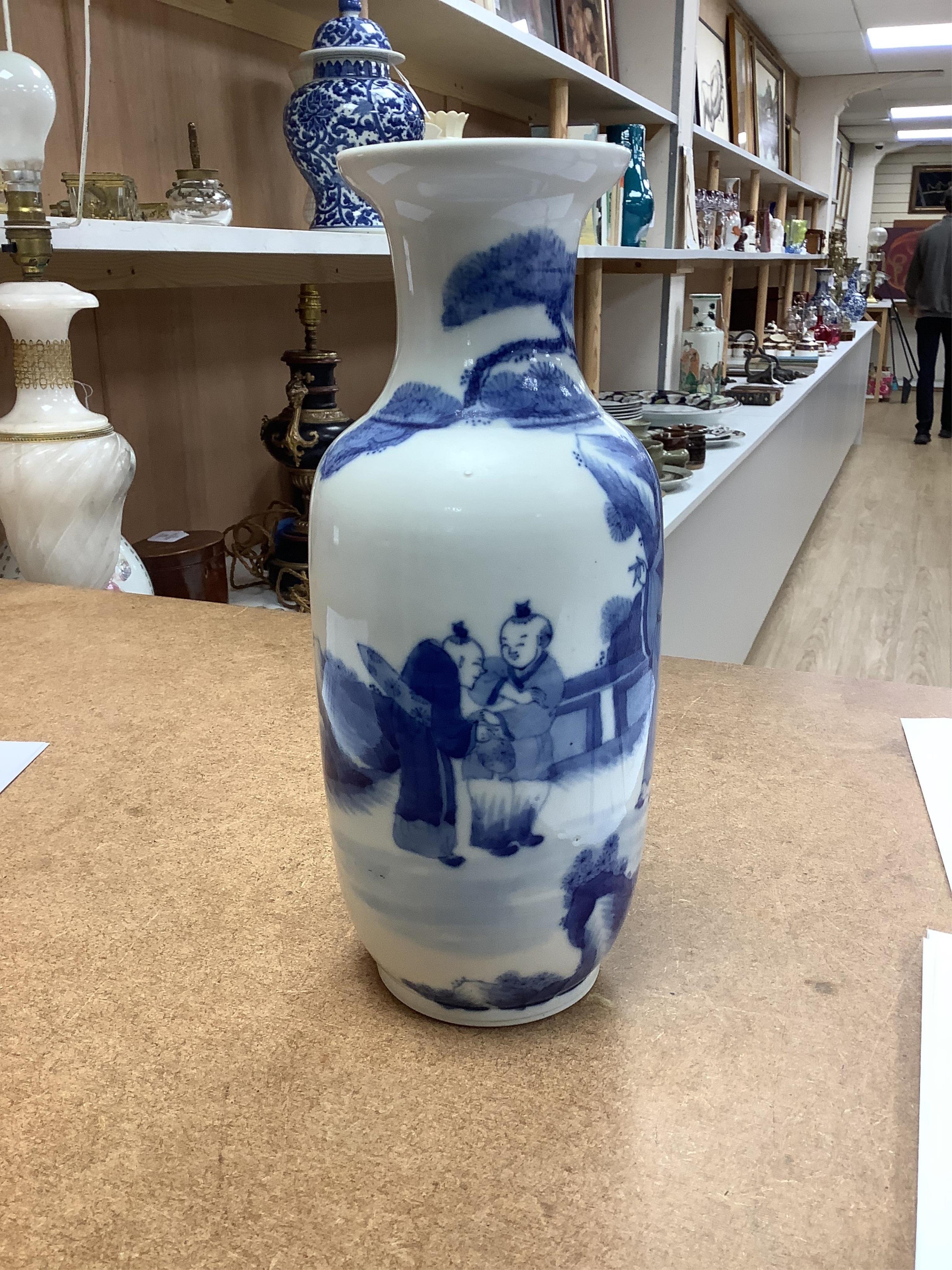 A Chinese blue and white rouleau vase, 25.5cm high. Condition - good